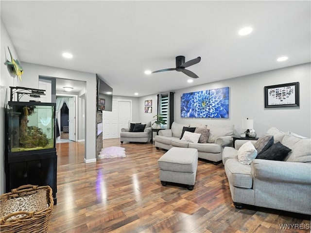 5137 William St, Lancaster, NY 14086 - living area with ceiling fan, wood finished floors, and recessed lighting
