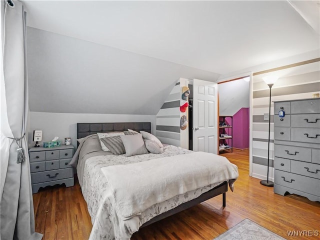 5137 William St, Lancaster, NY 14086 - bedroom with wood finished floors and vaulted ceiling