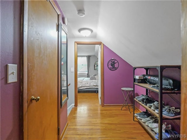 5137 William St, Lancaster, NY 14086 - corridor featuring light wood finished floors and vaulted ceiling