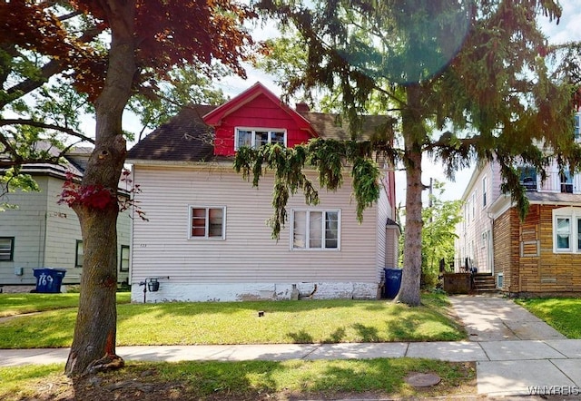 173 Hedley Pl, Buffalo, NY 14208 - view of home's exterior featuring a lawn