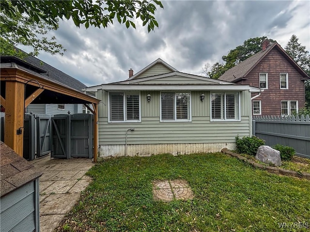 221 82nd St, Niagara Falls, NY 14304 - view of front of house featuring a gate
