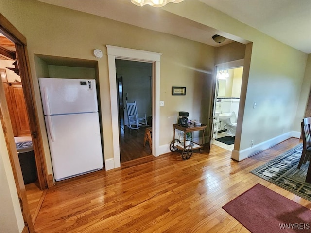 2207 Sheldon Dr, Allegany, NY 14706 - kitchen with freestanding refrigerator and light wood-type flooring