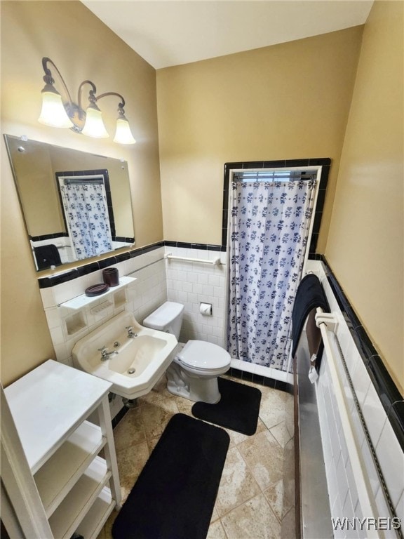 2207 Sheldon Dr, Allegany, NY 14706 - full bathroom featuring tile walls, a shower with shower curtain, and a wainscoted wall