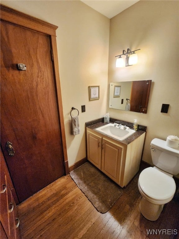 2207 Sheldon Dr, Allegany, NY 14706 - half bathroom featuring wood finished floors and vanity