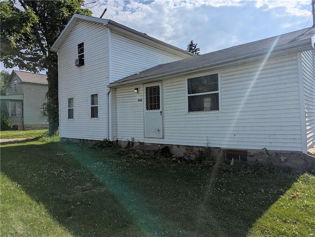 4182 Dresser Rd, Shelby, NY 14103 - back of house featuring entry steps, a yard, and a shingled roof