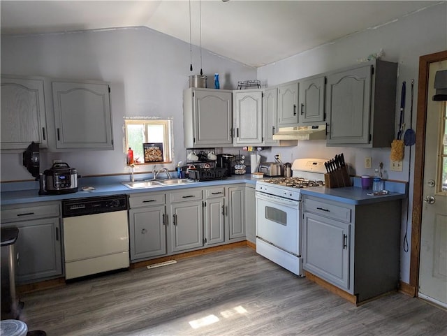 4182 Dresser Rd, Shelby, NY 14103 - kitchen featuring white appliances, under cabinet range hood, vaulted ceiling, light wood-style flooring, and gray cabinetry