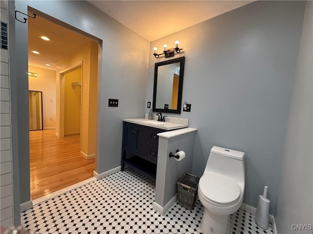 320 W 3rd St, Oswego-City, NY 13126 - bathroom featuring vanity and recessed lighting