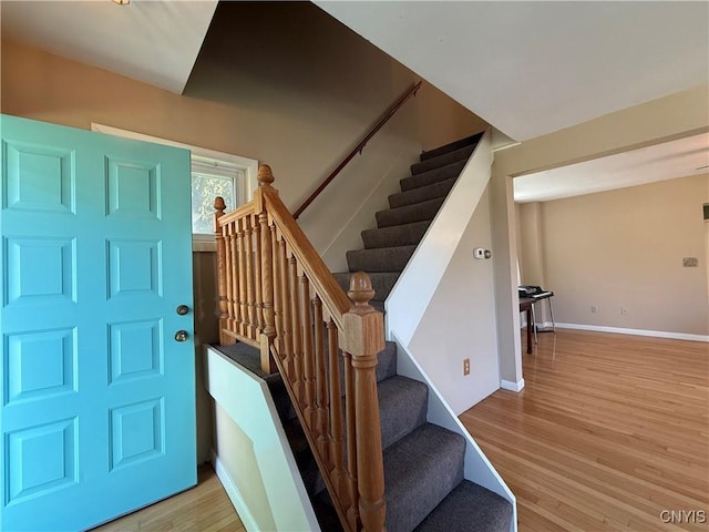320 W 3rd St, Oswego-City, NY 13126 - foyer entrance with light wood-style flooring and stairs