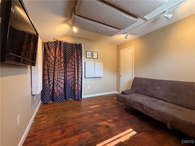 320 W 3rd St, Oswego-City, NY 13126 - living area featuring rail lighting, wood-type flooring, and lofted ceiling