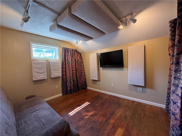 320 W 3rd St, Oswego-City, NY 13126 - unfurnished living room featuring track lighting, wood-type flooring, and lofted ceiling