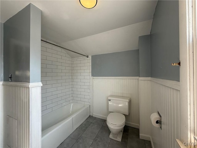 320 W 3rd St, Oswego-City, NY 13126 - full bath with tub / shower combination, wainscoting, tile patterned flooring, and vaulted ceiling