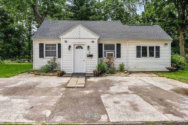 9 Lawrence Ave, New Hartford, NY 13413 - view of front of property featuring a shingled roof and cooling unit