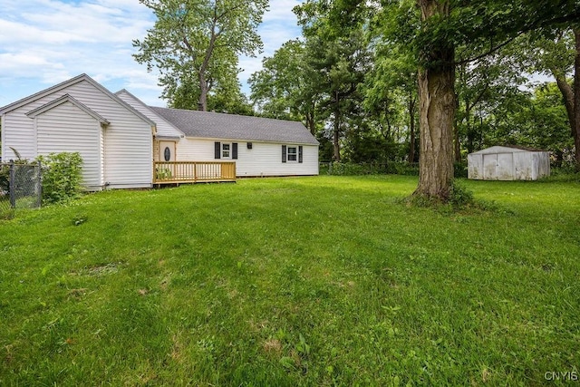9 Lawrence Ave, New Hartford, NY 13413 - view of yard featuring a deck and a storage shed