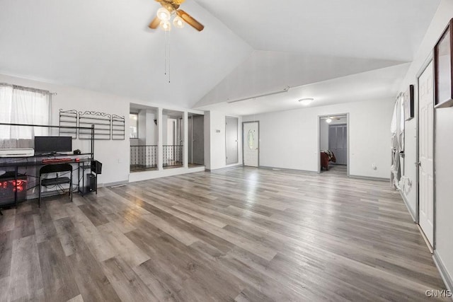 9 Lawrence Ave, New Hartford, NY 13413 - living room featuring high vaulted ceiling, a ceiling fan, and wood finished floors