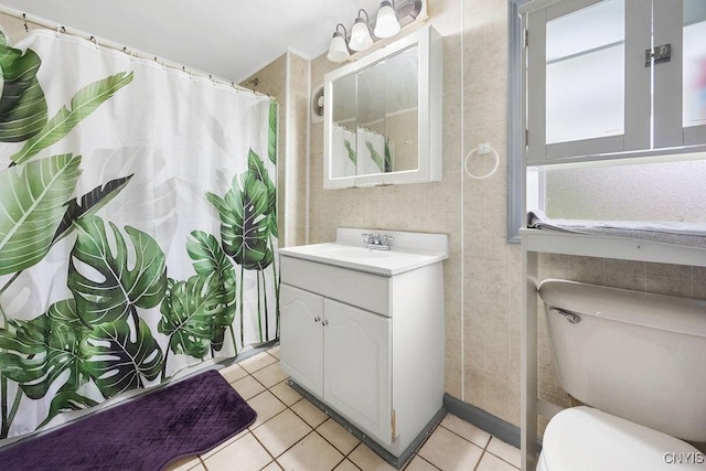 9 Lawrence Ave, New Hartford, NY 13413 - full bathroom featuring vanity, tile patterned floors, and curtained shower