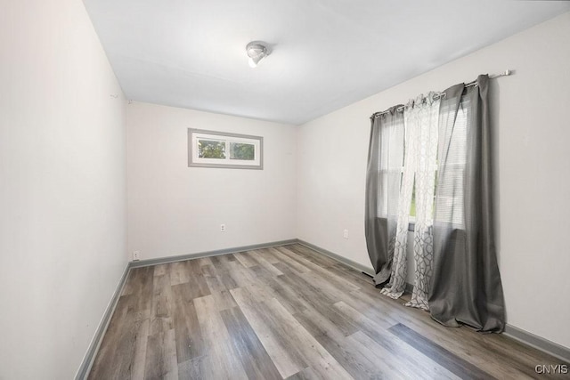 9 Lawrence Ave, New Hartford, NY 13413 - spare room featuring wood finished floors