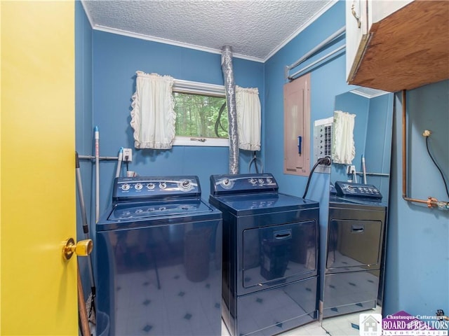 5152 John Darling Rd, Conowingo, NY 14726 - laundry room with cabinet space, washing machine and dryer, a textured ceiling, and ornamental molding
