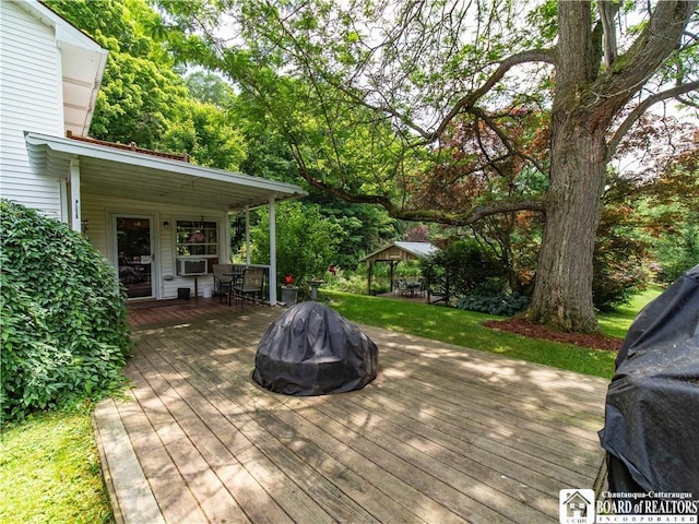 5152 John Darling Rd, Conowingo, NY 14726 - wooden terrace with a gazebo, cooling unit, and outdoor dining area