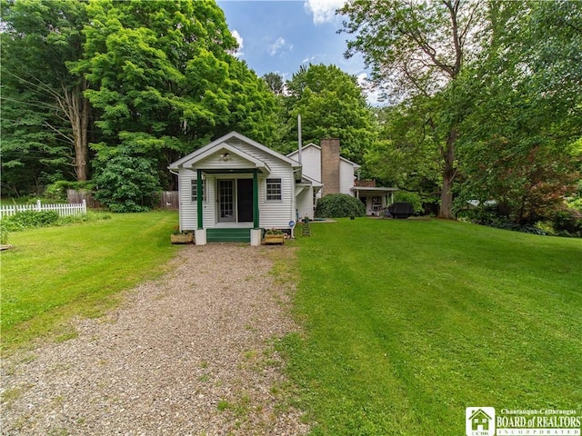 5152 John Darling Rd, Conowingo, NY 14726 - view of front of house with an outbuilding and gravel driveway