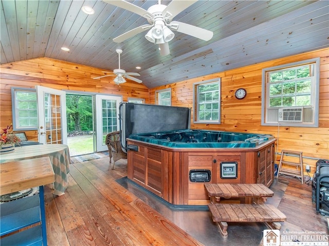 5152 John Darling Rd, Conowingo, NY 14726 - playroom with vaulted ceiling, hardwood / wood-style floors, wooden walls, cooling unit, and wooden ceiling