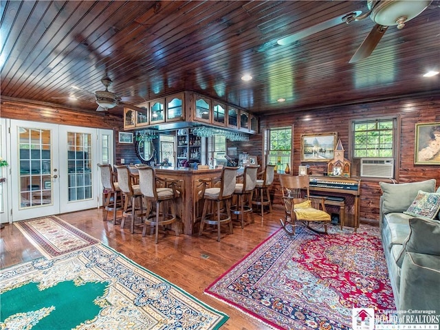 5152 John Darling Rd, Conowingo, NY 14726 - indoor bar featuring a ceiling fan, cooling unit, wood ceiling, french doors, and wood finished floors