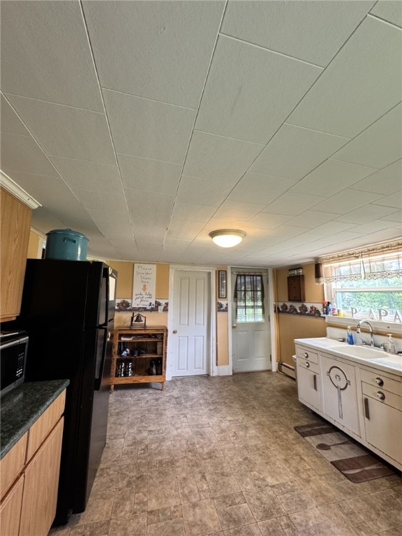 66 W Benton Ave, Port Allegany Boro, PA 16743 - kitchen featuring freestanding refrigerator and baseboard heating