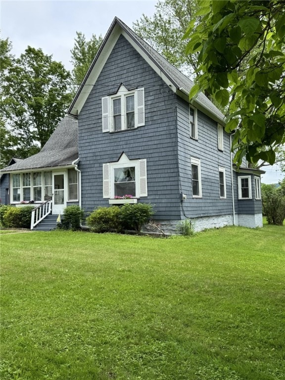 66 W Benton Ave, Port Allegany Boro, PA 16743 - view of front of house with a front lawn and roof with shingles