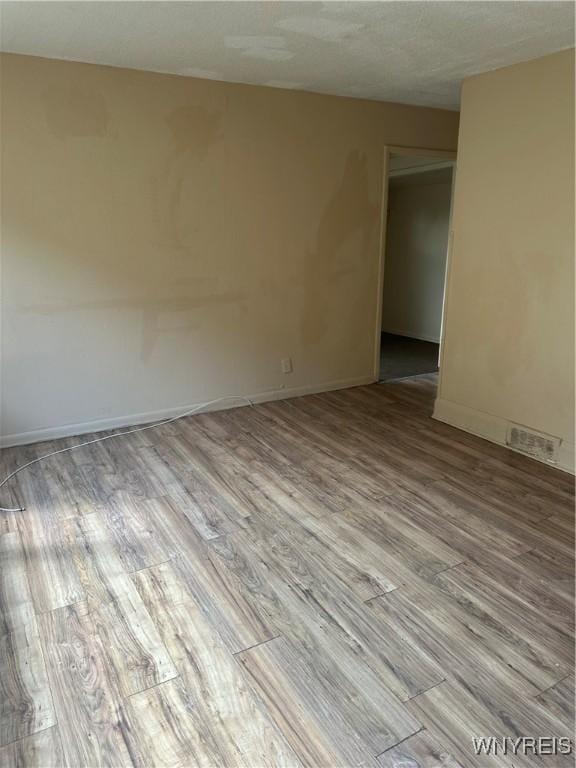 54 Decker St, Buffalo, NY 14215 - unfurnished room with wood finished floors