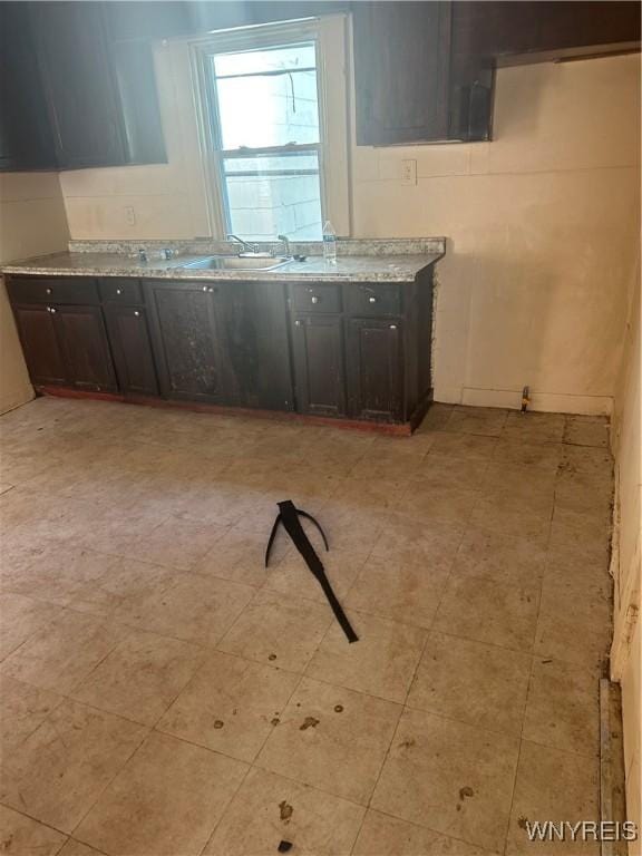 54 Decker St, Buffalo, NY 14215 - kitchen featuring light countertops and a sink