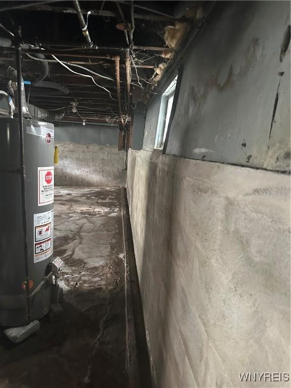 54 Decker St, Buffalo, NY 14215 - unfinished below grade area featuring water heater