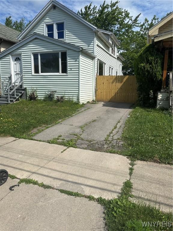 54 Decker St, Buffalo, NY 14215 - view of front facade featuring entry steps and driveway