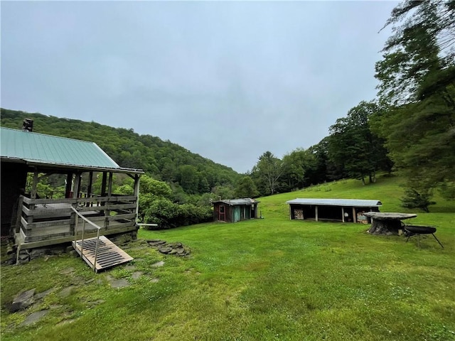 286 Hidden Hollow Farm Dr, Wharton, PA 16720 - view of green lawn with an outbuilding and a wooded view