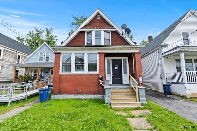49 Urban St, Buffalo, NY 14211 - bungalow-style home featuring brick siding and a front lawn
