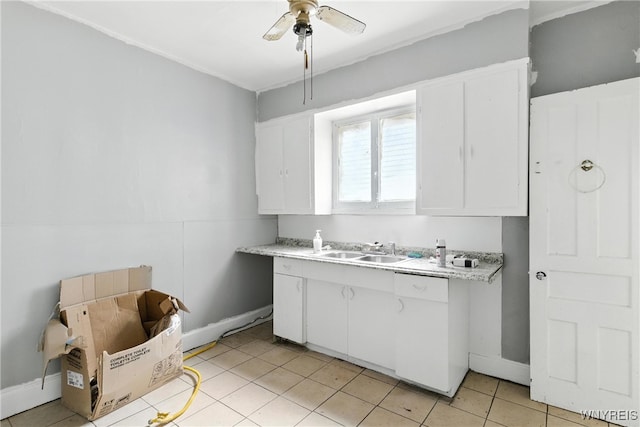 49 Urban St, Buffalo, NY 14211 - kitchen with white cabinets, light countertops, ceiling fan, and white dishwasher