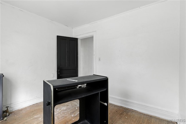 49 Urban St, Buffalo, NY 14211 - unfurnished office featuring hardwood / wood-style flooring and crown molding