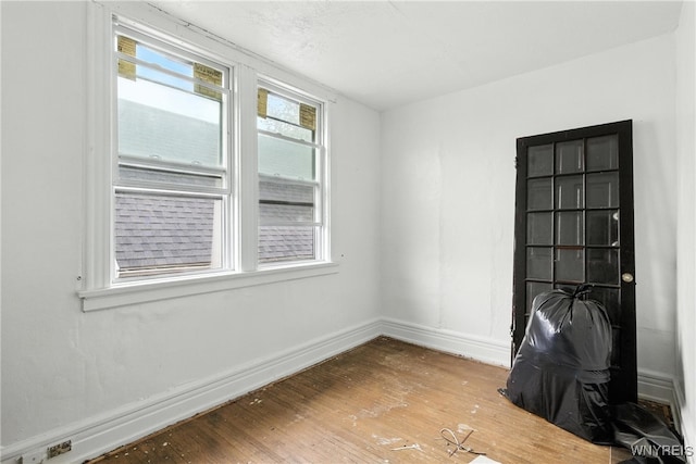 49 Urban St, Buffalo, NY 14211 - empty room with wood finished floors and baseboards
