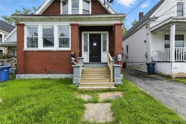 49 Urban St, Buffalo, NY 14211 - view of front of house featuring brick siding