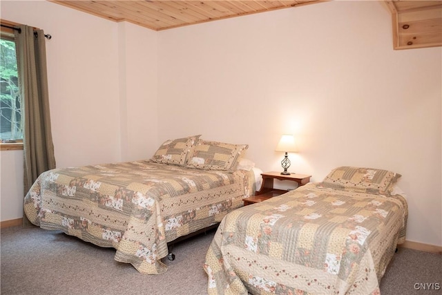 105 Garmon Ave, Webb, NY 13420 - carpeted bedroom featuring baseboards and wooden ceiling