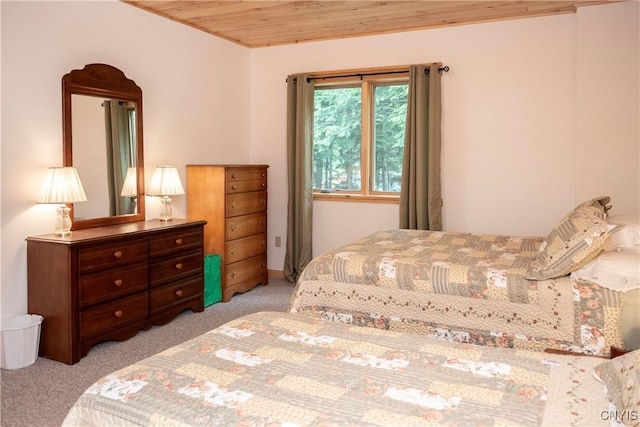 105 Garmon Ave, Webb, NY 13420 - bedroom with light colored carpet and wood ceiling