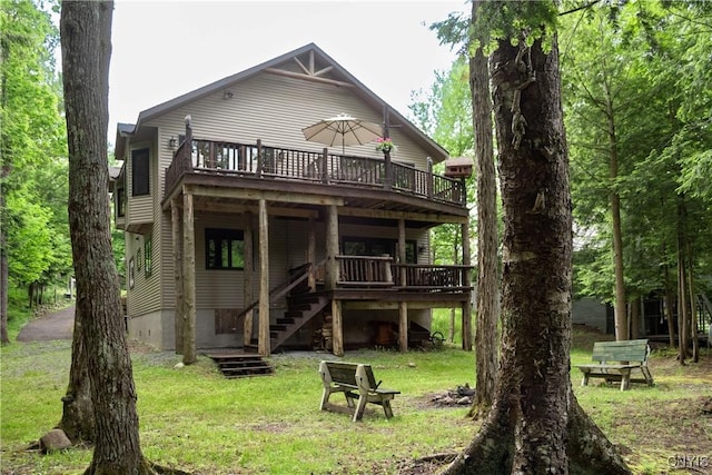 105 Garmon Ave, Webb, NY 13420 - back of property featuring a lawn, stairs, and a deck