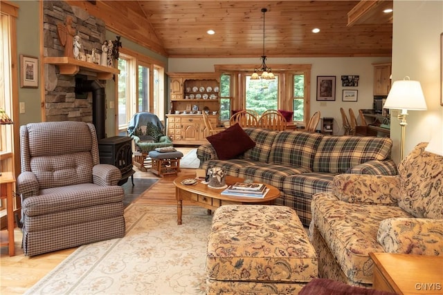 105 Garmon Ave, Webb, NY 13420 - living room featuring a wood stove, wood ceiling, wood finished floors, recessed lighting, and lofted ceiling