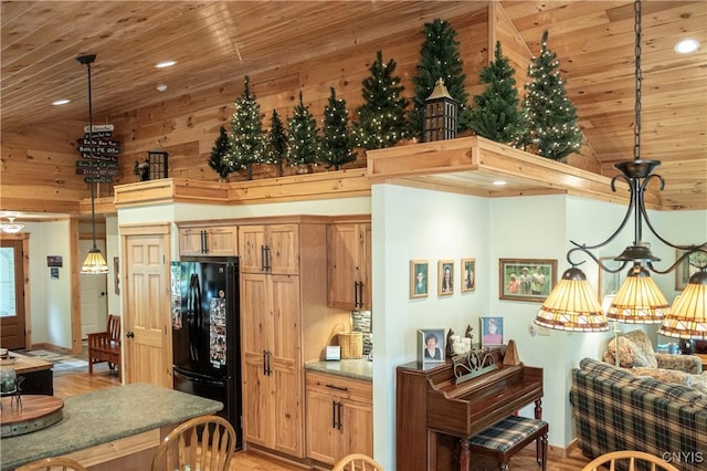 105 Garmon Ave, Webb, NY 13420 - kitchen with freestanding refrigerator, wood ceiling, light wood-style flooring, recessed lighting, and lofted ceiling