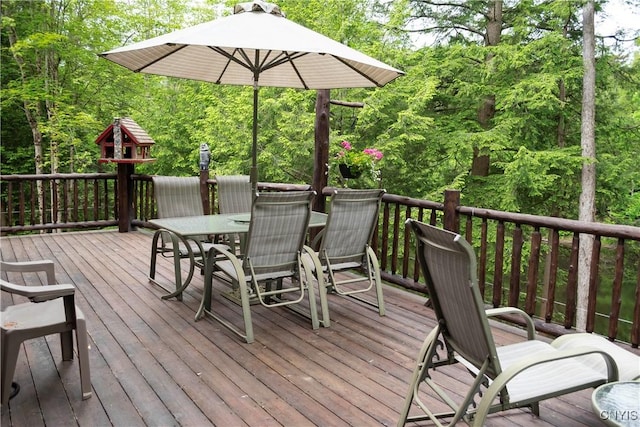 105 Garmon Ave, Webb, NY 13420 - wooden terrace with outdoor dining area