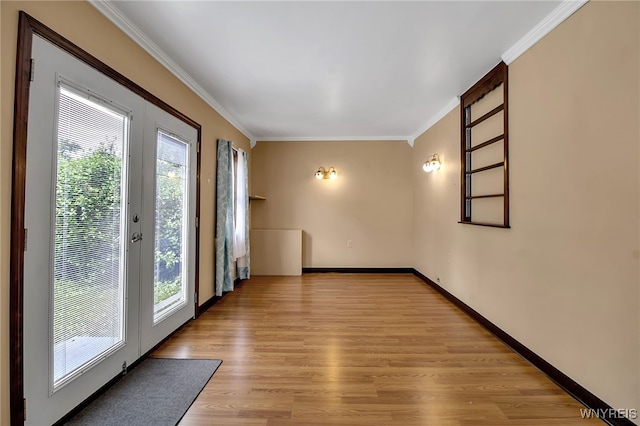 144 Flohr Ave, West Seneca, NY 14224 - empty room featuring healthy amount of natural light, crown molding, and light wood-style floors