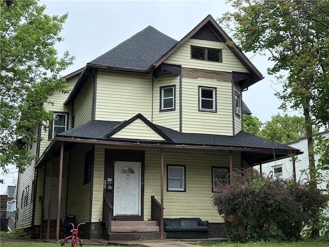 895 S Plymouth Ave, Rochester, NY 14608 - view of front of house with entry steps, roof with shingles, and covered porch
