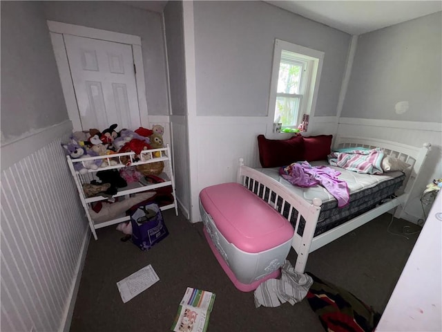 895 S Plymouth Ave, Rochester, NY 14608 - bedroom with a wainscoted wall