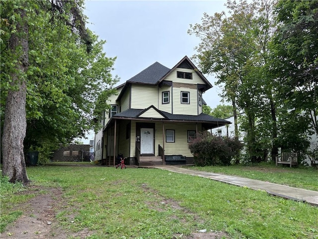 895 S Plymouth Ave, Rochester, NY 14608 - victorian-style house featuring covered porch and a front lawn