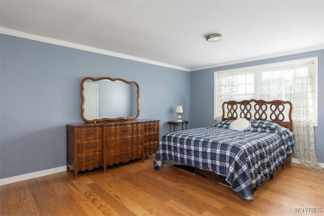 3212 Hickox Rd, Hamburg, NY 14075 - bedroom with wood finished floors and crown molding