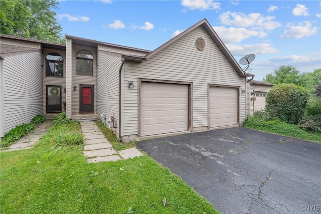 8433 Bubbling Springs Dr, Clay, NY 13027 - view of front of home with an attached garage and driveway