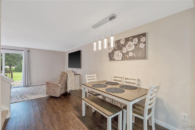 8433 Bubbling Springs Dr, Clay, NY 13027 - dining room featuring dark wood finished floors and baseboards